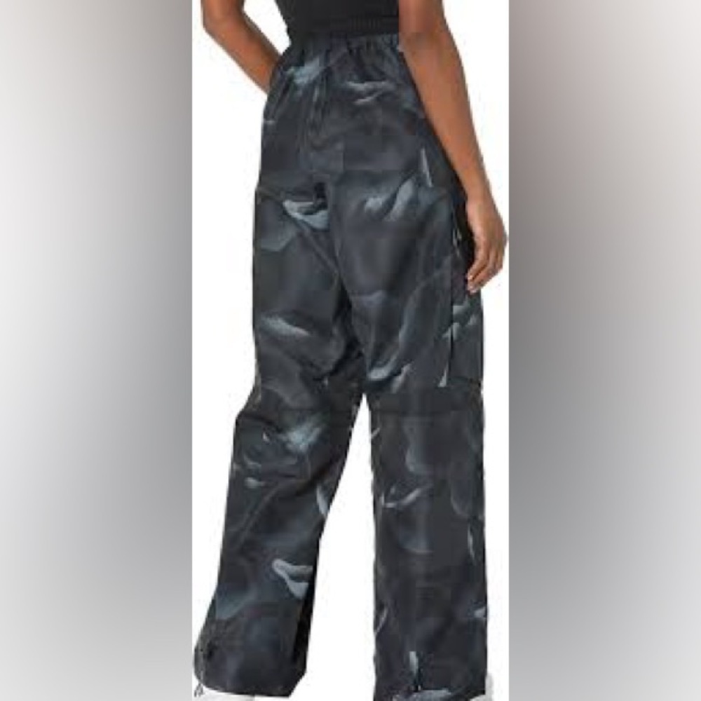Adidas BLACK CITY ESCAPE TRACK TROUSERS IN BLACK/MULTICOLOr new with tags.
